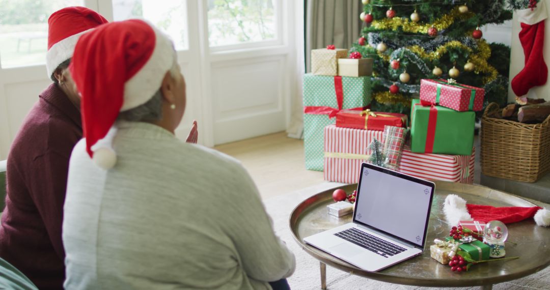 Elderly Couple Video Chatting During Christmas - Free Images, Stock Photos and Pictures on Pikwizard.com