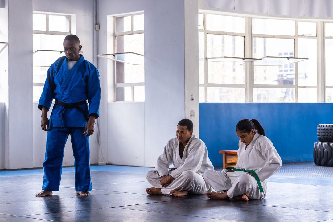 Martial Arts Training Intensity at Dojo with Instructor and Students