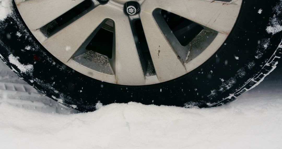Close-Up of Car Wheel in Snowy Conditions - Free Images, Stock Photos and Pictures on Pikwizard.com