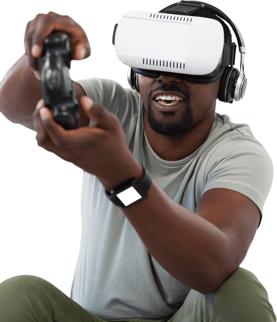 Smiling man with virtual reality headset holds gaming controller on transparent background