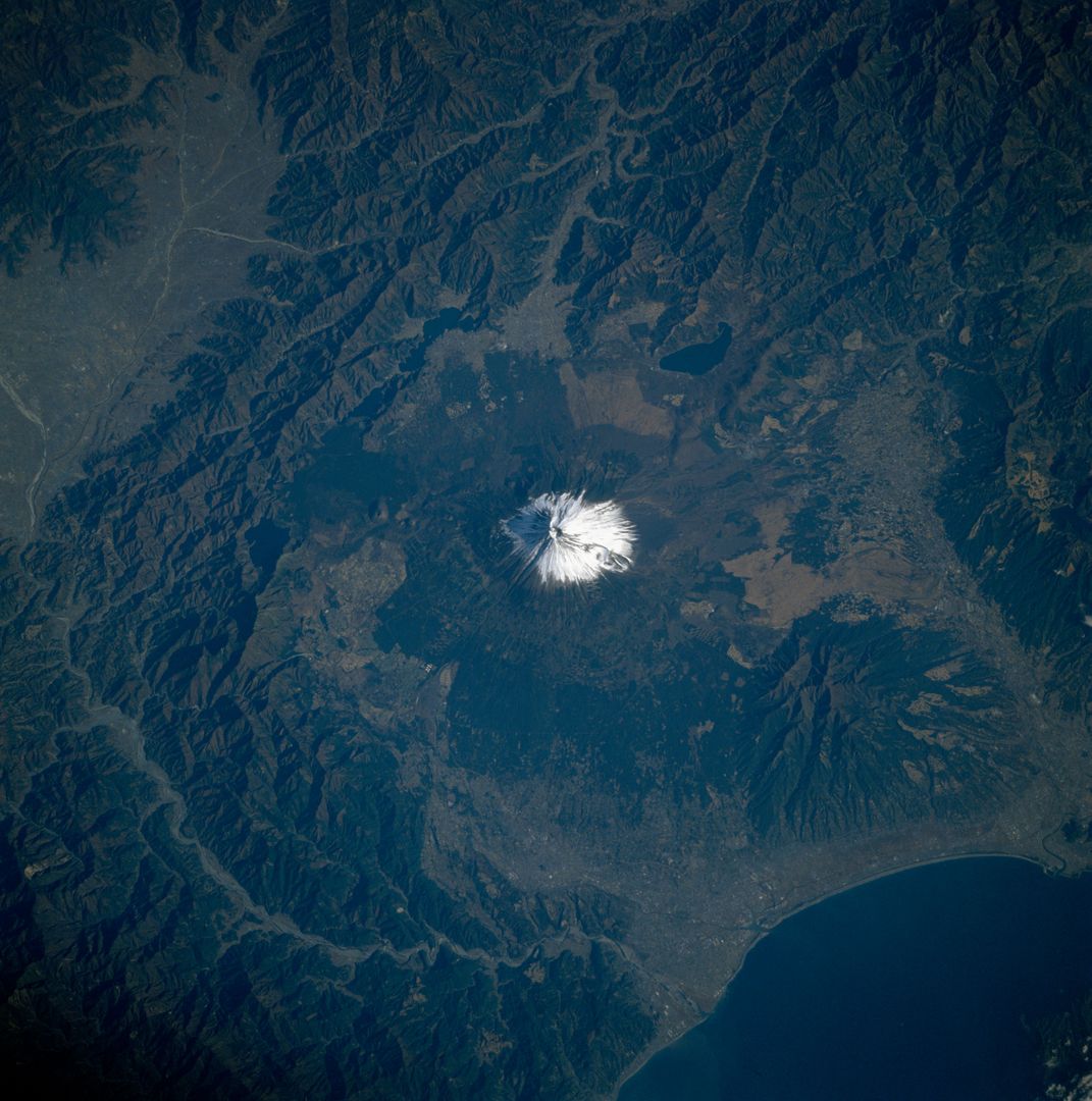 Aerial View of Mount Fuji Captured from Space Shuttle Columbia in 1983 - Free Images, Stock Photos and Pictures on Pikwizard.com