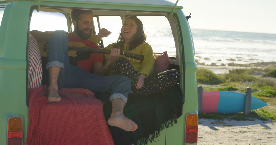 Couple Enjoying Road Trip by Beach in Vintage Van - Free Images, Stock Photos and Pictures on Pikwizard.com