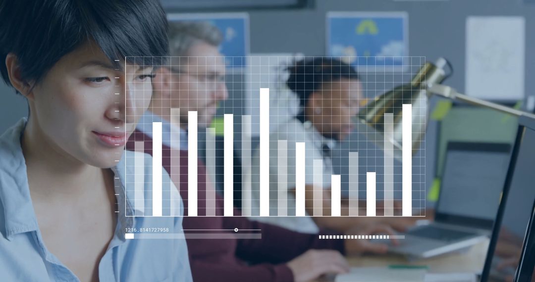Diverse Professionals Analyzing Data in Office Environment