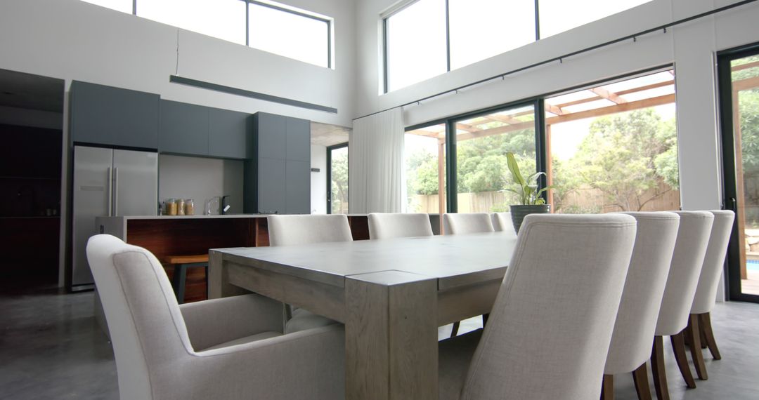 Modern Dining Room with Wooden Table and White Chairs - Free Images, Stock Photos and Pictures on Pikwizard.com