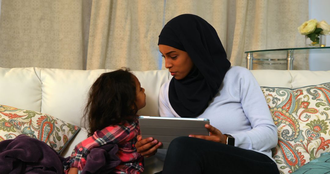 Mother and Daughter Spending Quality Time with Tablet