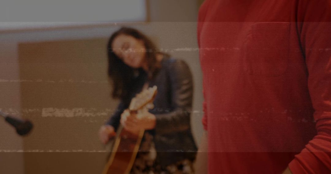 Guitarist in Studio Creating Live Music Atmosphere