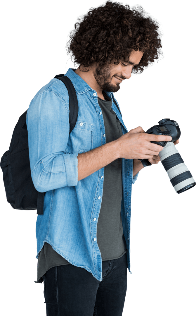 Young Male Photographer Adjusting Camera Settings Transparent