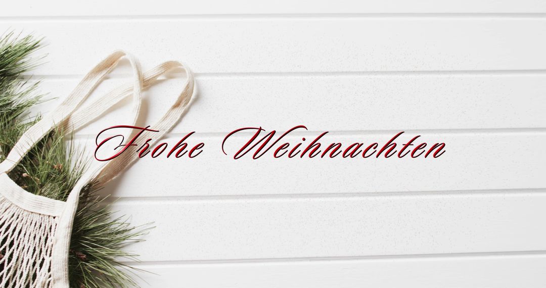 Frohe Weihnachten Text on White Wooden Background with Pine Branches