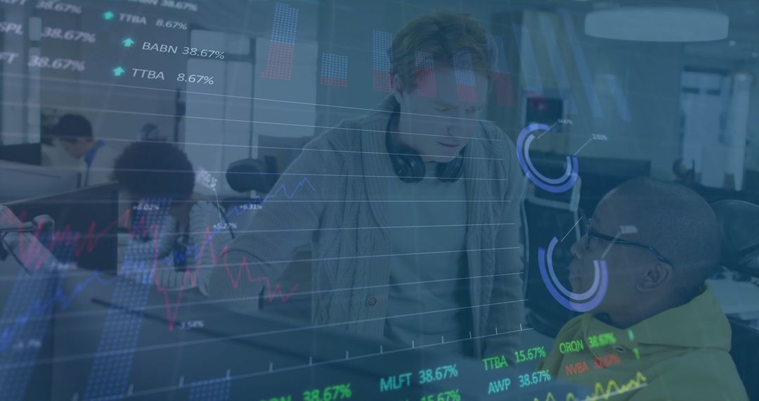 Colleagues Collaborating on Data Analysis in Modern Workspace
