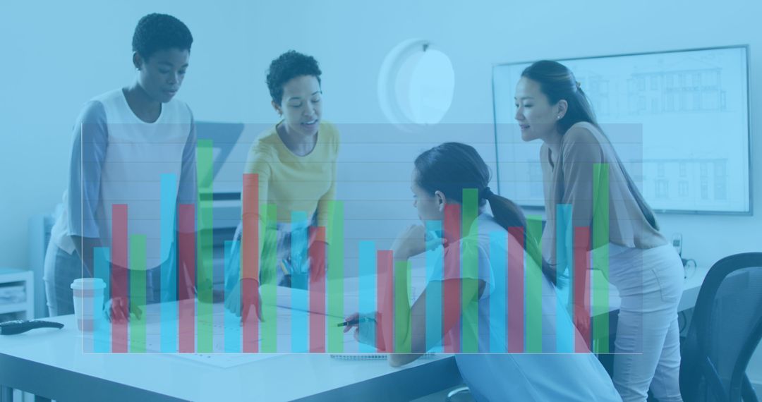 Diverse Professionals Analyzing Business Data in Modern Office