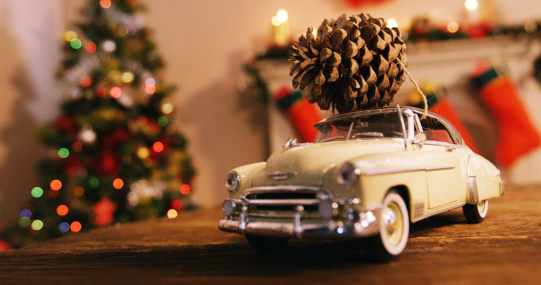 Toy car with pine cone on wooden table during christmas time 4k - Free Images, Stock Photos and Pictures on Pikwizard.com