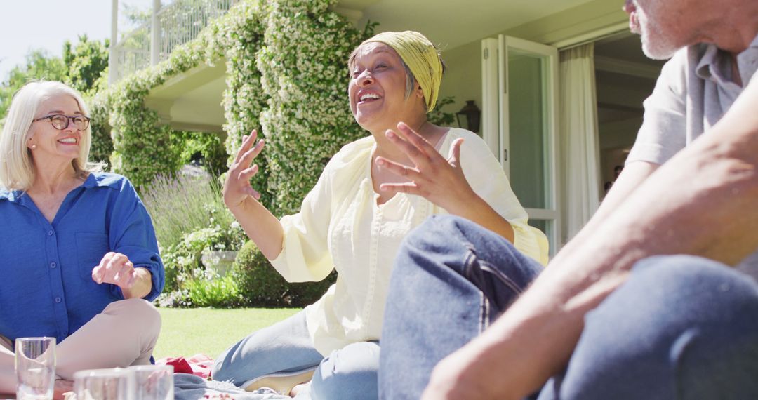 Group of Happy Senior Friends Enjoying Outdoor Conversation - Free Images, Stock Photos and Pictures on Pikwizard.com