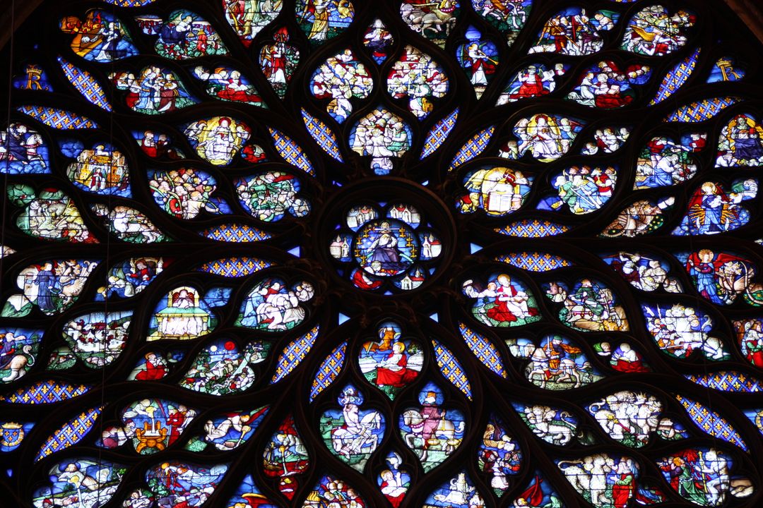 Ornate Stained Glass Window with Detailed Religious Scenes - Free Images, Stock Photos and Pictures on Pikwizard.com