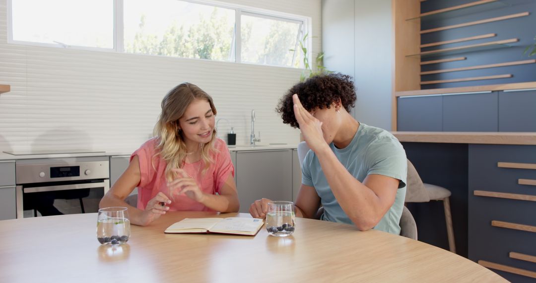 Couple Collaborating on Plans at Home