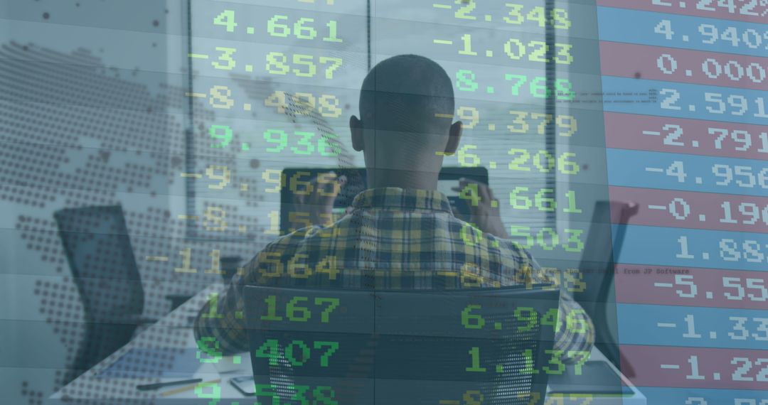 Businessman Analyzing Digital Financial Data on Screens