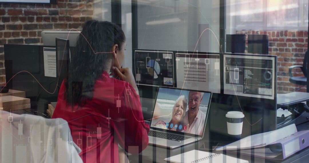 Businesswoman Analyzing Data and Having Video Call in Modern Office