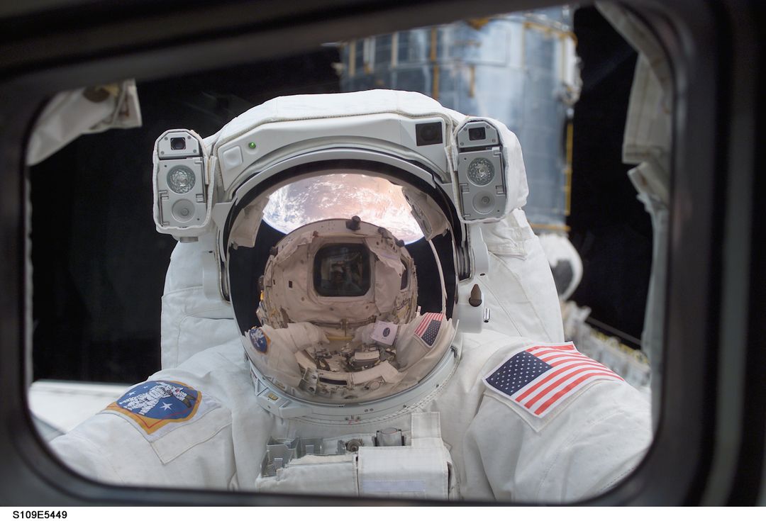 Astronaut Executes Spacewalk Outside Shuttle Columbia - Free Images, Stock Photos and Pictures on Pikwizard.com