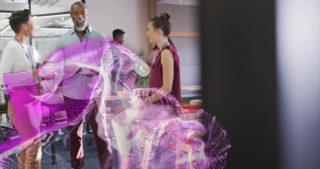 Team collaborating with augmented reality hologram in office lounge showing digital anatomy and data