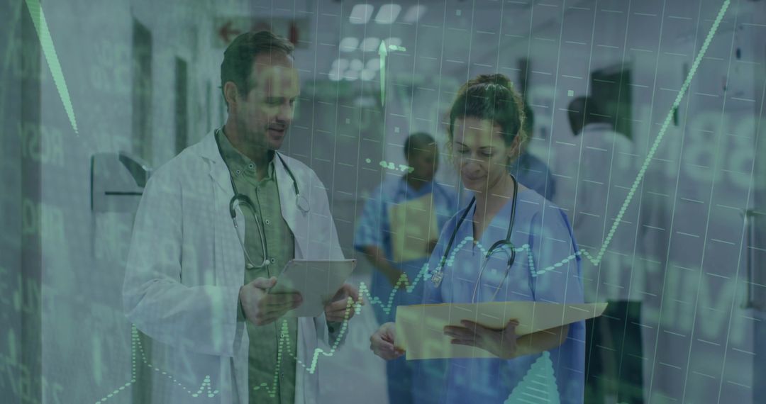 Doctors Discussing Clinical Data in Hospital Corridor