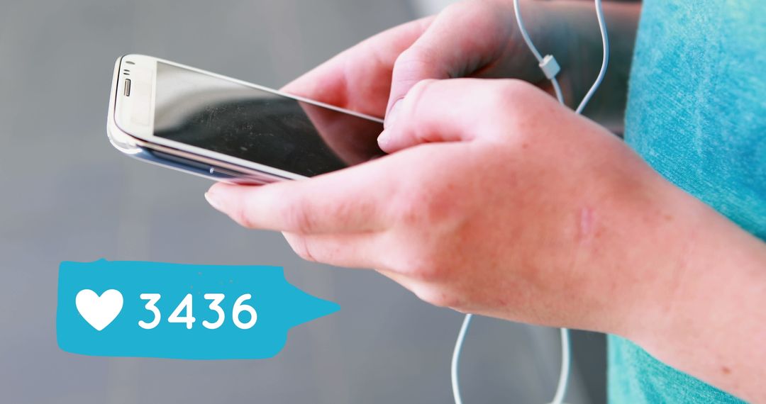 Person Using Smartphone for Social Media Engagement