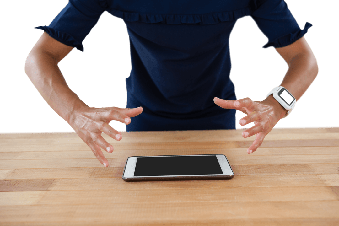 Frustrated Executive Hovering Over Transparent Tablet on Wood Surface