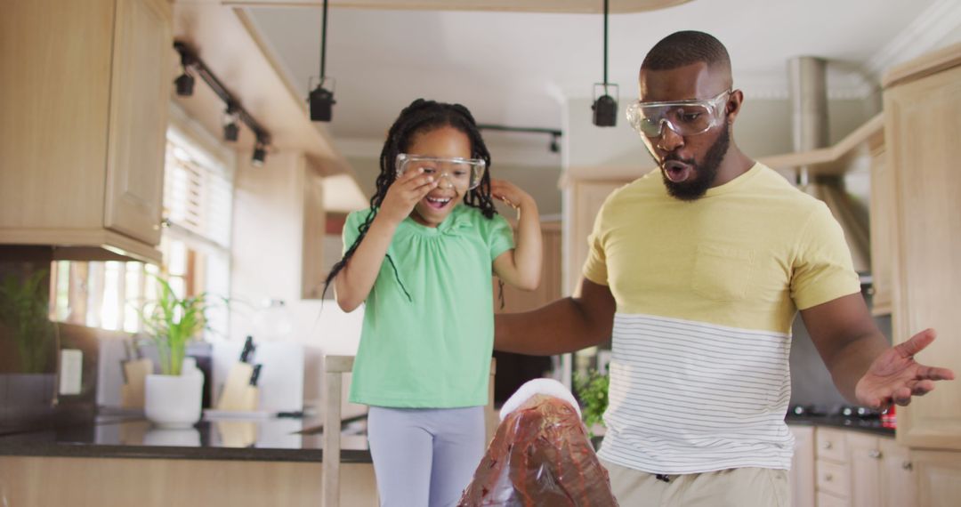 Father And Daughter Exploring Science With Soda Eruption Experiment