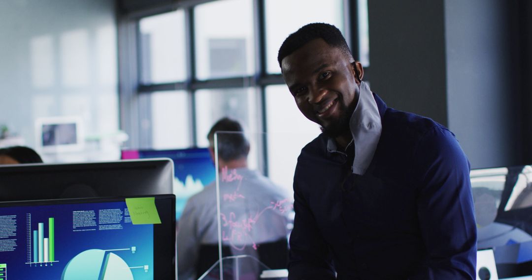 Office Worker Using Tablet with Mask Lowered During Pandemic
