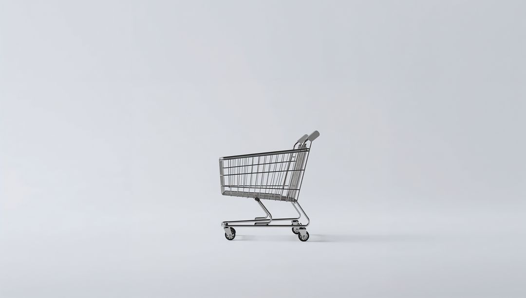 Minimalist Chrome Shopping Cart Sitting on Pale Gray Floor for Retail Concept