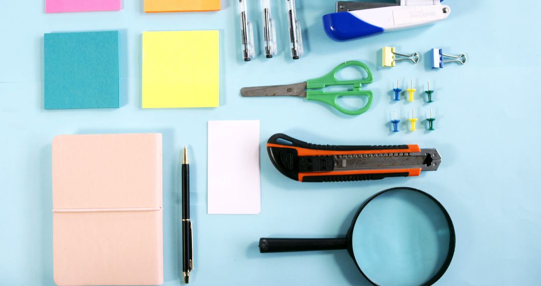 Neatly Arranged Office Supplies on Blue Background - Free Images, Stock Photos and Pictures on Pikwizard.com