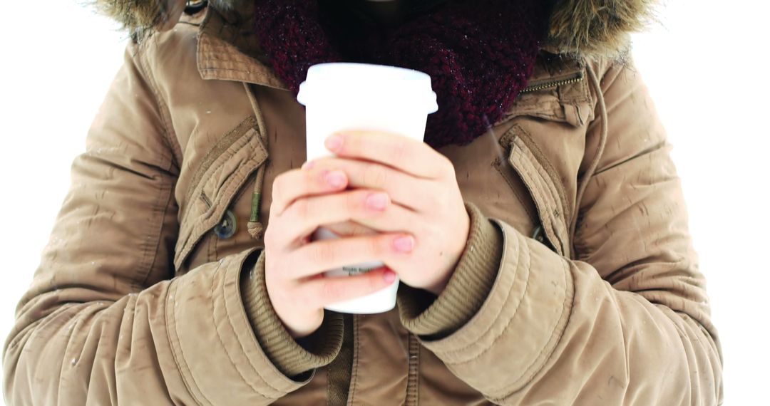 Person Holding Coffee Cup in Cold Weather - Free Images, Stock Photos and Pictures on Pikwizard.com