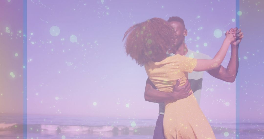 Joyful Couple Dancing on a Serene Beach with Pastel Filter