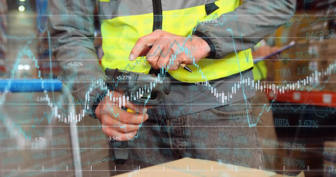 Warehouse Worker with Barcode Scanner Analyzing Inventory Data