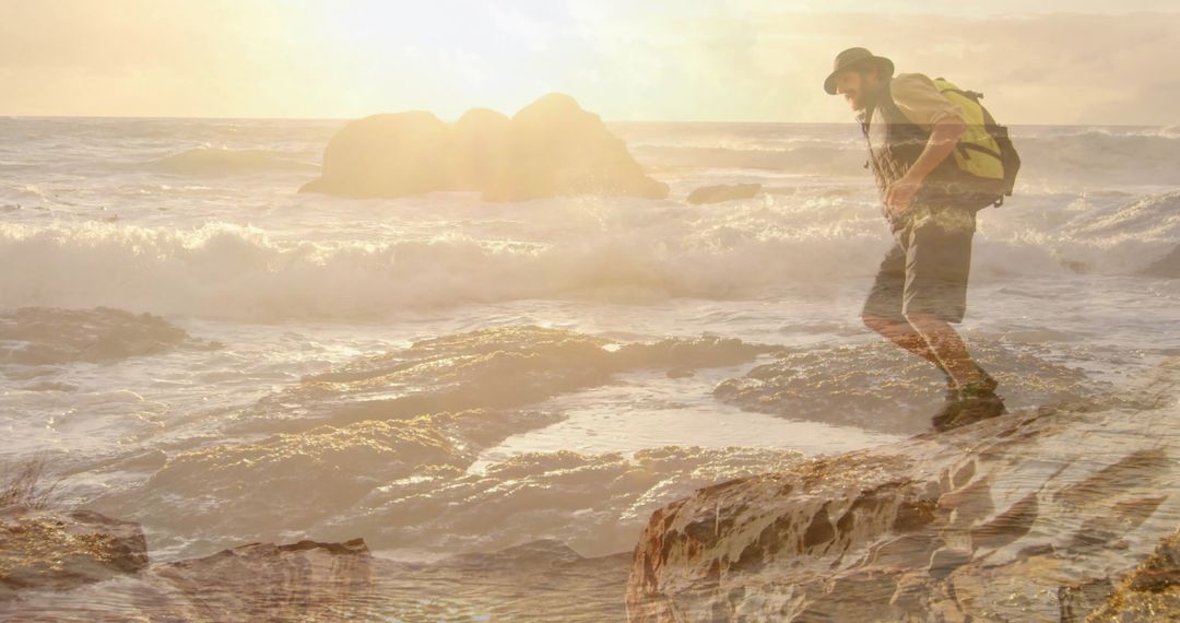 Hiker Exploring Rocky Shoreline at Sunset with Backpack