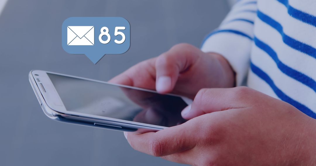 Person Checking Smartphone with New Email Notification