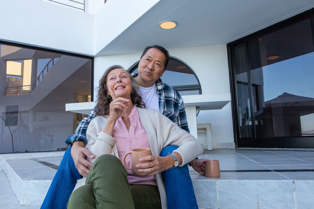 Senior Couple Enjoying Tranquil Morning at Modern Home