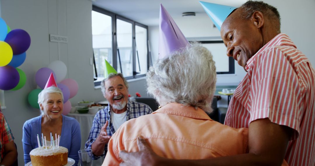 Group of Elderly Friends Celebrating Birthday Party with Joy - Free Images, Stock Photos and Pictures on Pikwizard.com