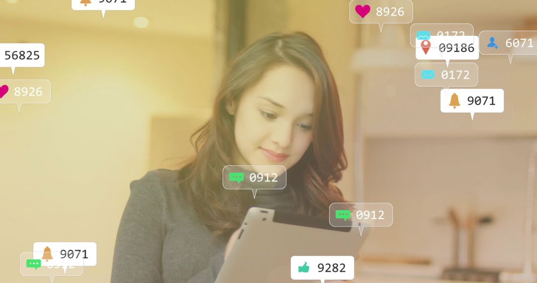 Woman Interacting with Digital Notifications on Tablet in Warm Kitchen