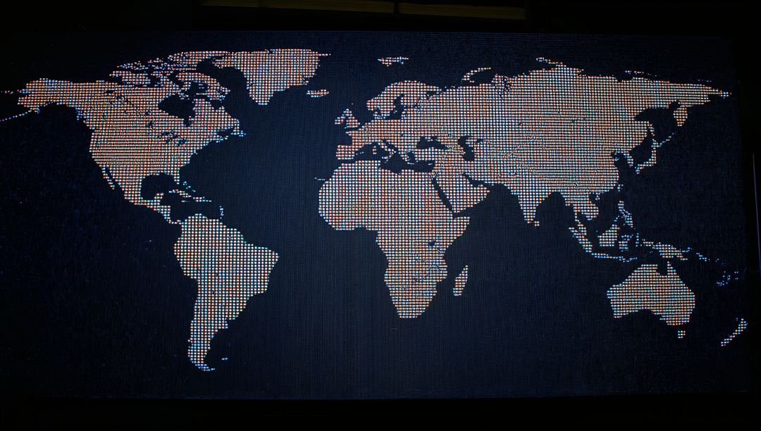 LED World Map Display Highlighting Global Connectivity and Data Exchange