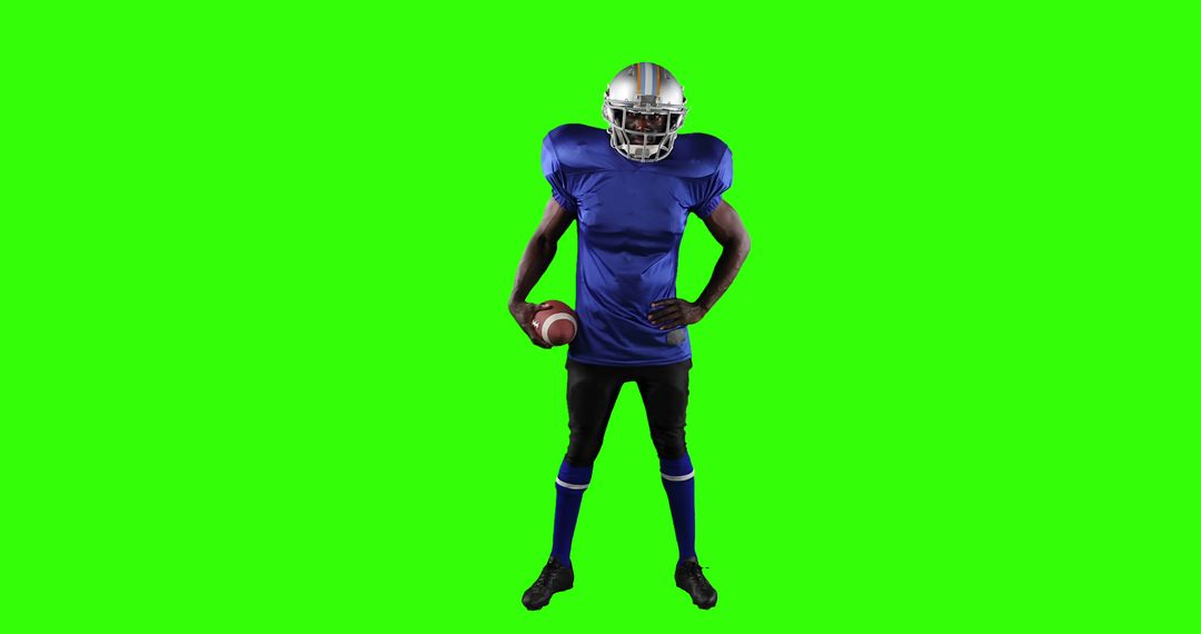 Football Player in Blue Jersey Standing with Ball on Green Screen Background - Free Images, Stock Photos and Pictures on Pikwizard.com