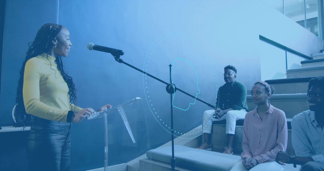 Young Woman Presenting at Campus Stairs with Microphone and Engaged Student Audience