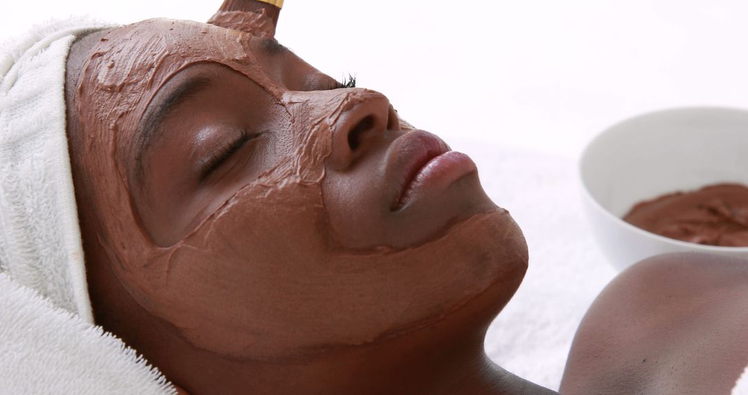 Relaxed Woman Receiving Mud Face Mask Treatment at Spa - Free Images, Stock Photos and Pictures on Pikwizard.com