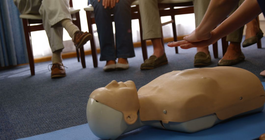 CPR Training Session with Group of People - Free Images, Stock Photos and Pictures on Pikwizard.com