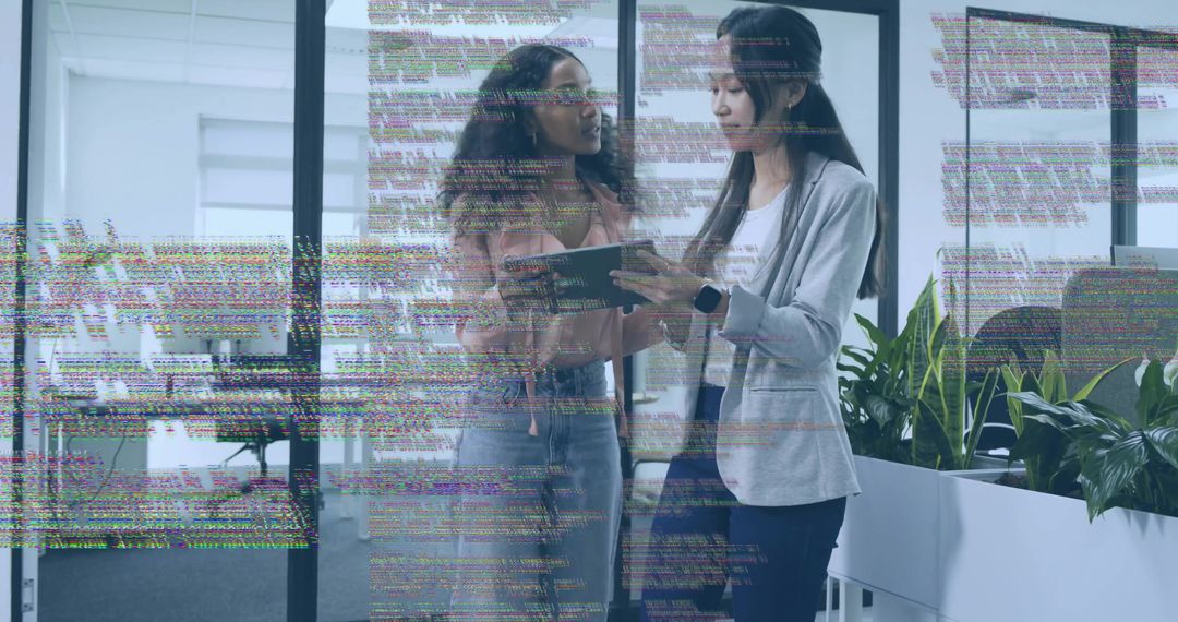 Business Colleagues Collaborating with Digital Technology in Modern Office