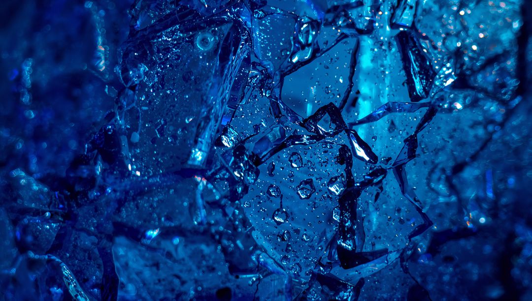 Deep Blue Crystal Shards Macro Showing Droplets and Refracted Light