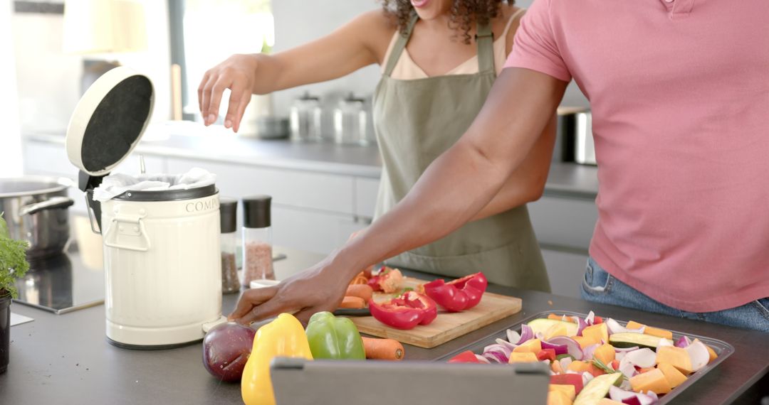 Couple Collaborating in Stylish Kitchen Preparing Vegetables