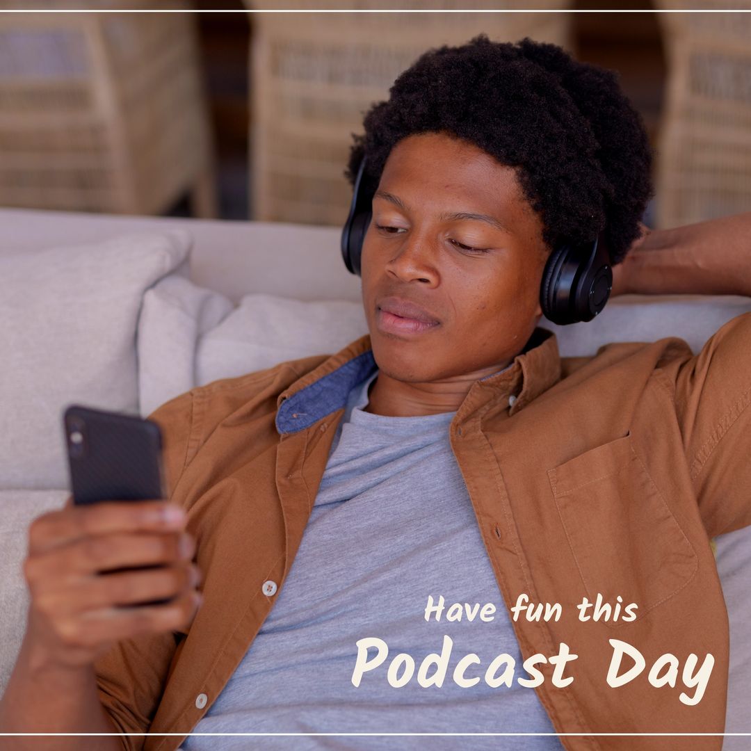 Young African American man enjoys podcast at home on Podcast Day. - Download Free Stock Templates Pikwizard.com
