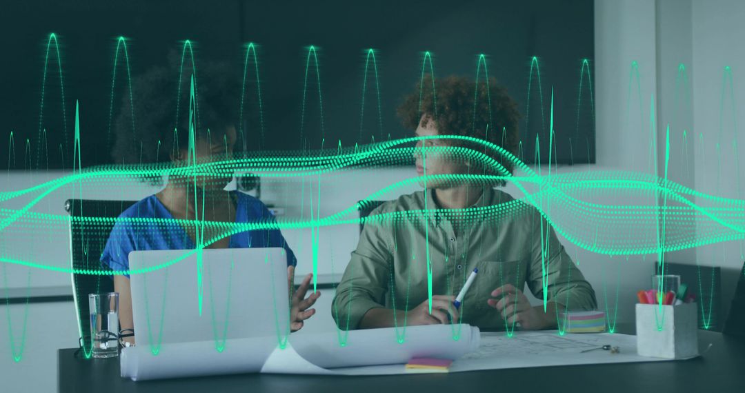 Office Team Collaborating on Technology with Digital Overlay