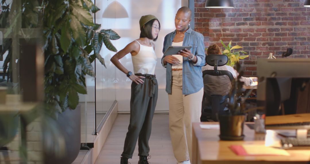 Colleagues Collaborating in Modern Co-working Space