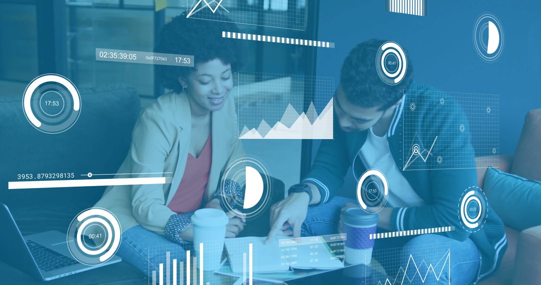 Diverse Team Analyzing Financial Data with Digital Interface in Modern Office