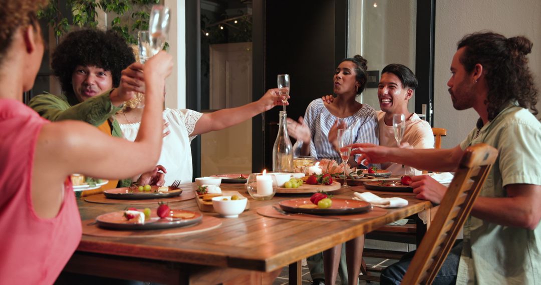 Friends Toasting at Outdoor Dinner Party Celebration